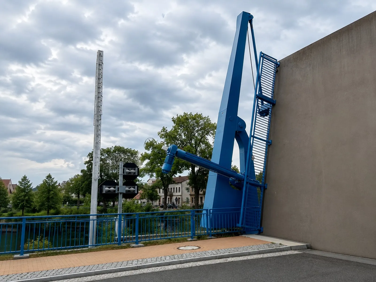 Open movable bridge with blue electric actuator in outdoor duty